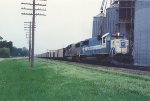 Loaded coal train rolls east